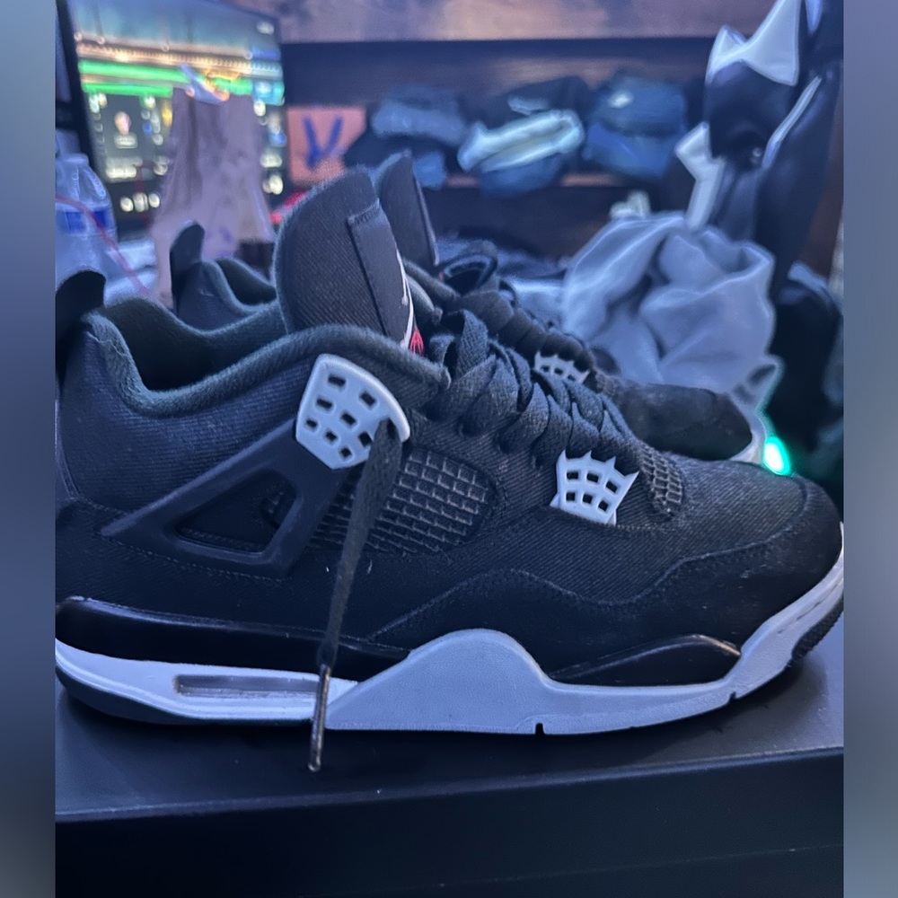 Jordan 4 black canvas proof of authenticity on last slide